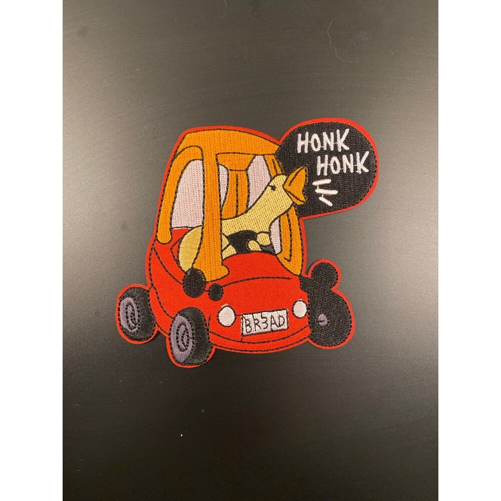 Honk Honk goose in a car iron on patch